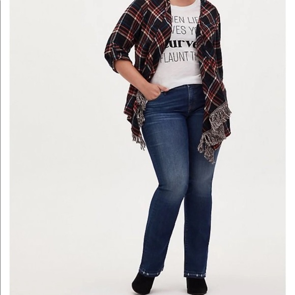 Torrid mid rise bootcut jean with hem detail